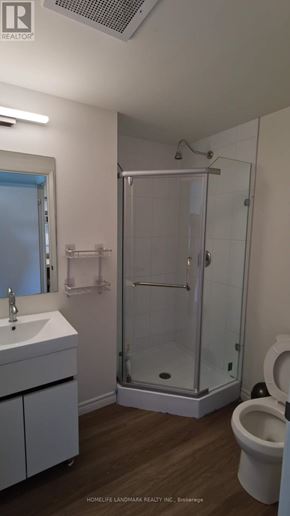 Waterloo condo for rent - A kitchen with white appliances and cabinets.