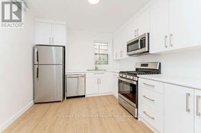 Hamilton (Stinson) multi-family for rent - A hallway with a white door and a white wall.