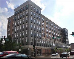 Chicago apartment for rent - a large building on the corner of a city street