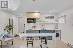 Port Hope apartment for rent - A realtor photo of a kitchen and living room.