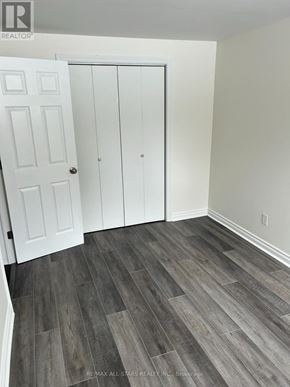 Georgina (Keswick South) apartment for rent - A room with a white door and a white cabinet.