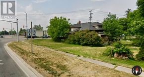 Southwold (Talbotville) apartment for rent - A REALTOR® logo is on a sign in front of a house.