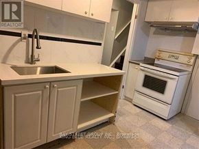 Toronto (Agincourt North) apartment for rent - A kitchen with a sink and an oven.