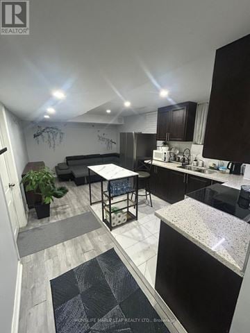 Brampton (Fletcher's Meadow) apartment for rent - A modern kitchen with a dining table and chairs.