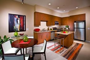 Long Beach apartment for rent - a kitchen and dining room with a table and chairs