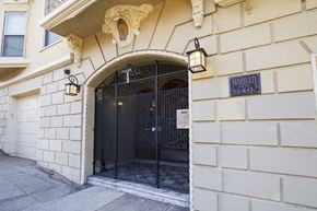 San Francisco apartment for rent - A building with a black gate and a sign that says "Marley 140".