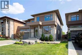 Ancaster apartment for rent - A modern house with a well-maintained lawn in front.