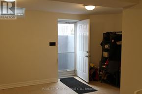 Vaughan (Maple) apartment for rent - A hallway with a door leading to a balcony.