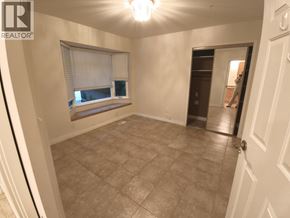 Belcarra apartment for rent - A room with a window and a door is for rent.