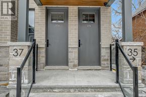 Ottawa multi-family for rent - The front door of a house with the number 37 on it.