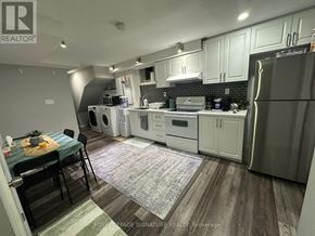 Waterloo apartment for rent - A kitchen with a table and chairs in it.