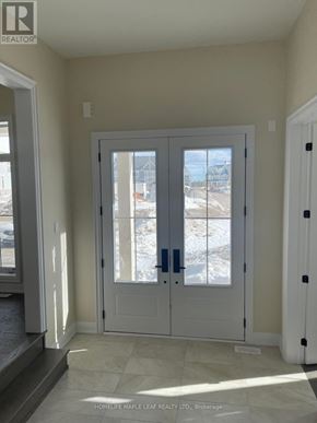 Oro-Medonte apartment for rent - A white double door with a glass window in the middle.