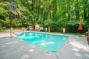 Atlanta apartment for rent - the swimming pool at the retreat at thousand oaks apartments with a resort style pool