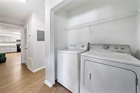 Atlanta apartment for rent - a white laundry room with two washes and a dryer