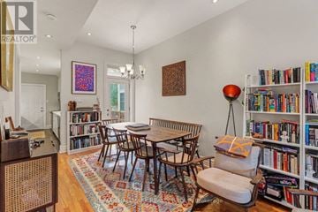 Ottawa apartment for rent - A living room with a bookshelf filled with books.