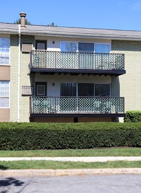 Lancaster apartment for rent - an apartment building with two balconies and a sidewalk