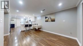Toronto (West Hill) apartment for rent - A realtor's office with a desk and chairs.