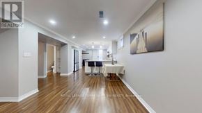 Toronto (West Hill) apartment for rent - A spacious room with a dining table set up in the middle.