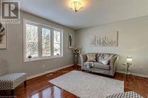 London East (East P) apartment for rent - A living room with a couch, chair, and a rug.
