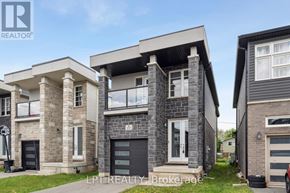 Welland (Lincoln/Crowland) apartment for rent - A modern two-story house with a balcony and garage.