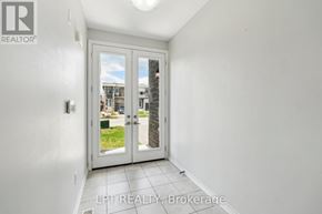 Welland (Lincoln/Crowland) apartment for rent - A white room with a glass door leading outside.