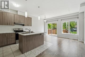 Welland (Lincoln/Crowland) apartment for rent - A kitchen with a sink, stove, and cabinets is shown in this image.