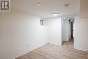 Toronto (Dovercourt-Wallace Emerson-Junction) apartment for rent - A room with a doorway leading to another room.