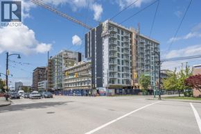 Vancouver apartment for rent - A construction site with a crane and a building under construction.