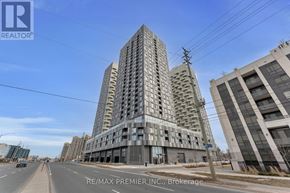 Vaughan (Concord) condo for rent - A tall building with a lot of windows is under construction.