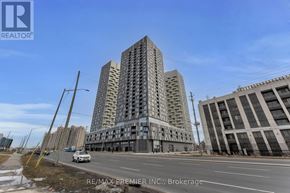 Vaughan (Concord) condo for rent - A large building with the RE/MAX Premier Inc. logo on it.
