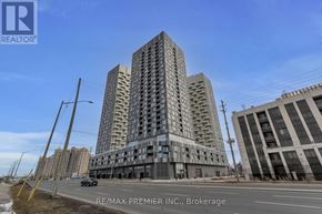 Vaughan (Concord) condo for rent - A tall building with a grey facade stands in the foreground of a city street.