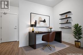 Clarington (Bowmanville) condo for rent - A modern home office with a desk, chair, and bookshelf.