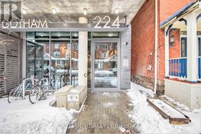 Ottawa condo for rent - The entrance to a building with the number 2241 on it.