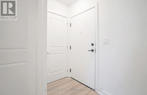 Toronto (Yorkdale-Glen Park) condo for rent - A white door is open to a hallway.