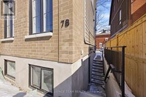 Ottawa apartment for rent - A building with the number 7B on it.