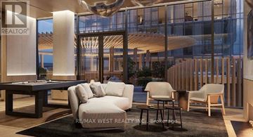 Toronto (Waterfront Communities) condo for rent - A modern living room with a pool table and comfortable seating.