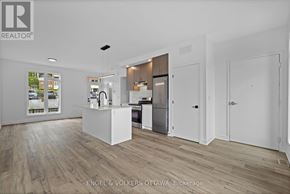 Ottawa apartment for rent - A realtor office with a white reception desk and a white framed picture on the wall.