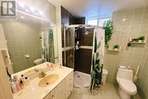 Toronto (Newtonbrook East) apartment for rent - A bathroom with a sink, toilet, and shower.