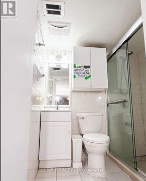 Toronto (Newtonbrook West) apartment for rent - A white toilet with a sign above it that says "Leave no paper in the toilet.".