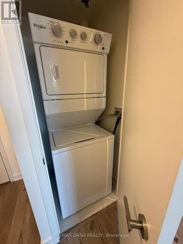 Toronto (Parkwoods-Donalda) condo for rent - A white Whirlpool oven and microwave are installed in a kitchen.
