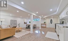 Richmond Hill (Crosby) apartment for rent - A well-lit, spacious living room with a kitchen area in the background.