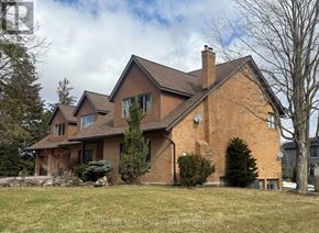 King (King City) apartment for rent - A large brick house with a brown roof and a chimney.