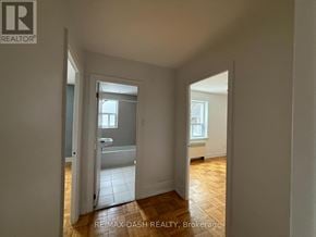 Toronto (Stonegate-Queensway) multi-family for rent - A room with a doorway leading to another room.