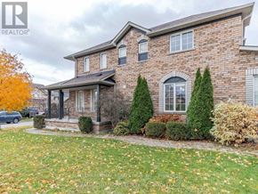 Vaughan (Vellore Village) apartment for rent - A brick house with a lawn in front.