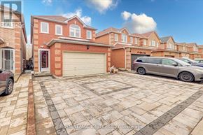 Markham (Middlefield) apartment for rent - A house with a garage and a car parked in front.
