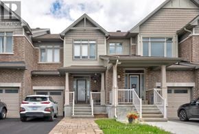 Ottawa townhouse for rent - A house with a car parked in front of it.