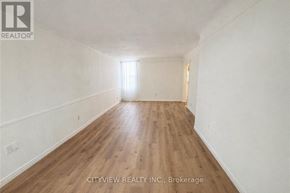 Hamilton (Landsdale) apartment for rent - A room with wooden flooring and white walls.