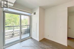 Vaughan (Beverley Glen) condo for rent - A room with a sliding glass door leading to a balcony.