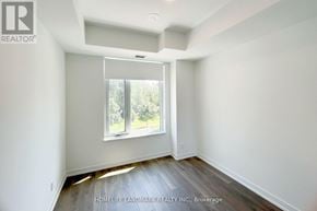 Vaughan (Beverley Glen) condo for rent - A room with a window and wooden flooring.