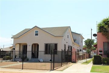 Los Angeles apartment for rent - A house with a black fence in front of it.